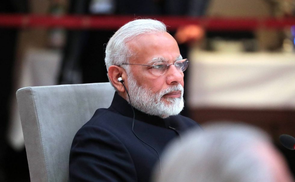 Prime_Minister_of_India_Narendra_Modi_at_an_informal_meeting_of_heads_of_state_and_government_of_the_BRICS_countries,_Hamburg_2017_wikimedia_free