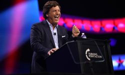 Tucker_Carlson_at_Turning_Point_Action_Conference_2023_free_wikimedia
